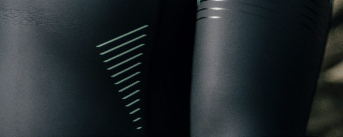 Close-up of a black electronic device with a geometric pattern