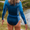 Fato de mergulho Yulex® de neoprene azul para mulher com mangas compridas.