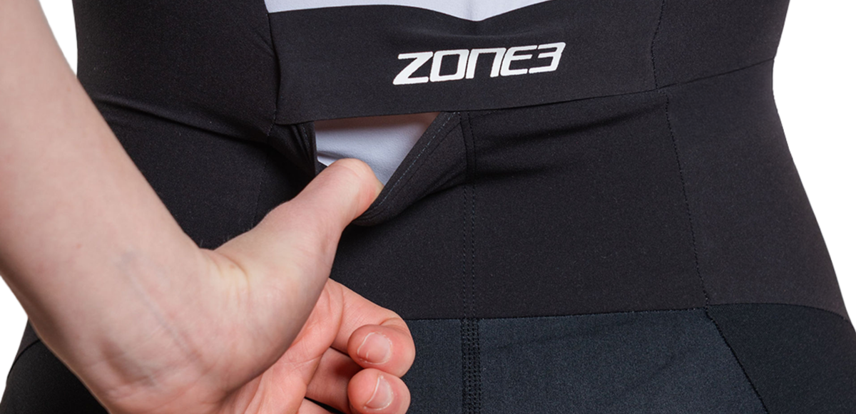 Close up of Lava Long Distance Full Zip Short Sleeve Trisuit on a white background